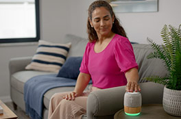 Woman turning on My Mood Bible™